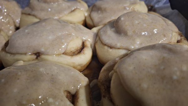 sourdough cinnamon buns with glaze closeup